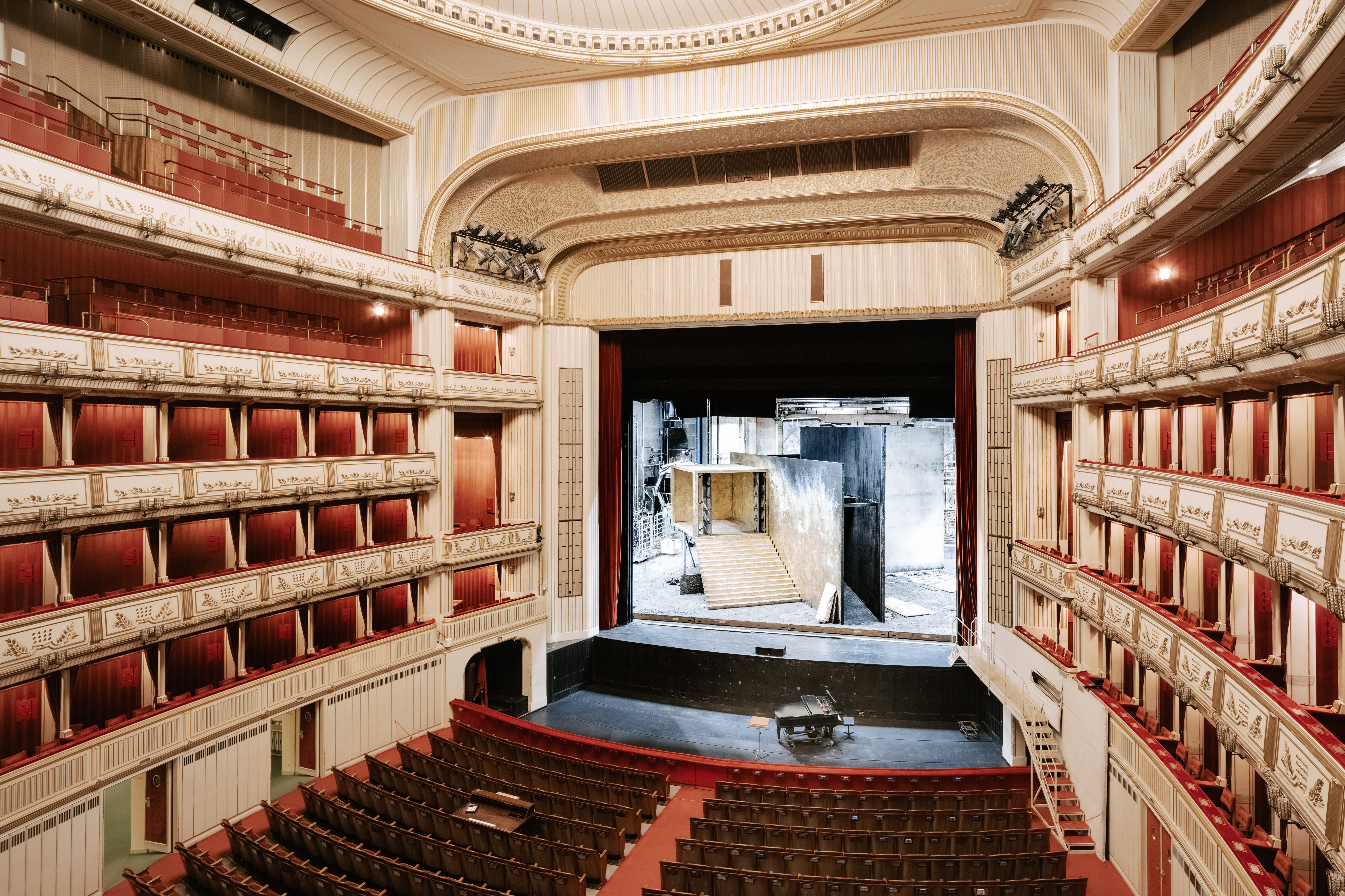 View of the auditorium of the Vienna State Opera, looking at the stage, on the left and right the boxes