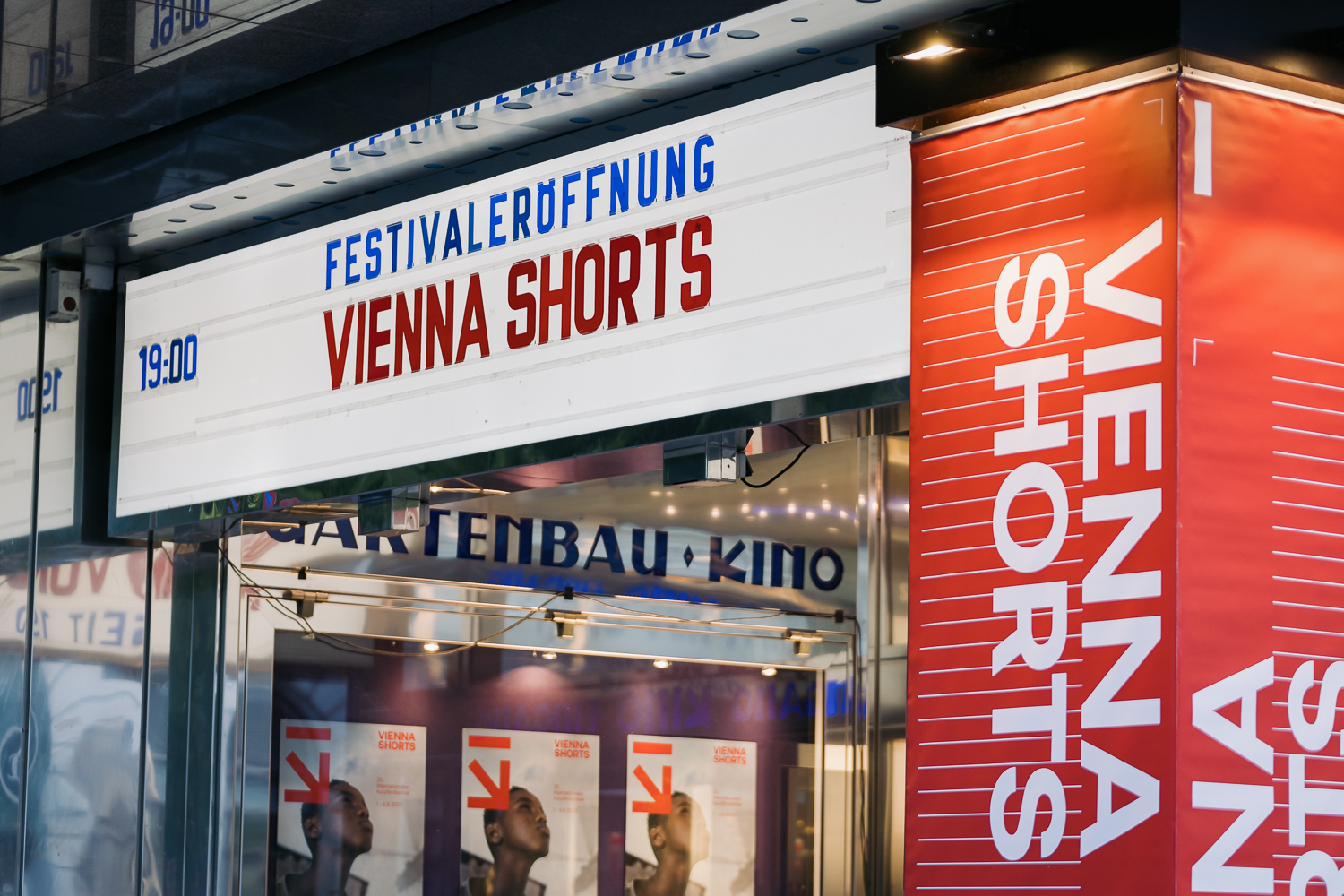 The photo shows the Gartenbaukino in Vienna, branded for the 2023 opening of the Vienna Shorts short film festival